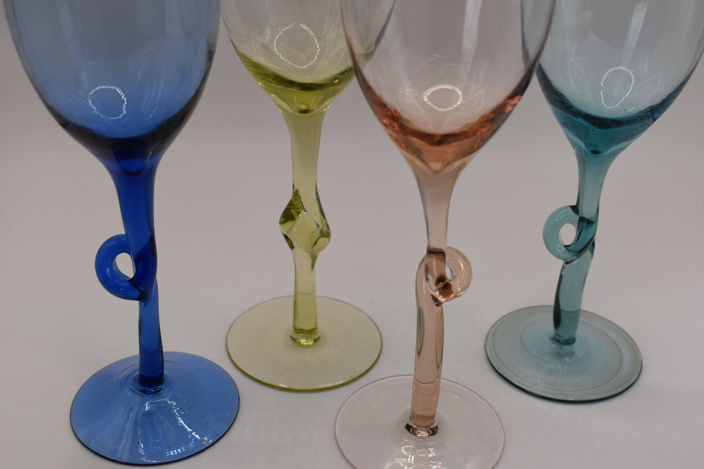 Set of 4 Harlequin coloured Wine Glasses with knotted stems