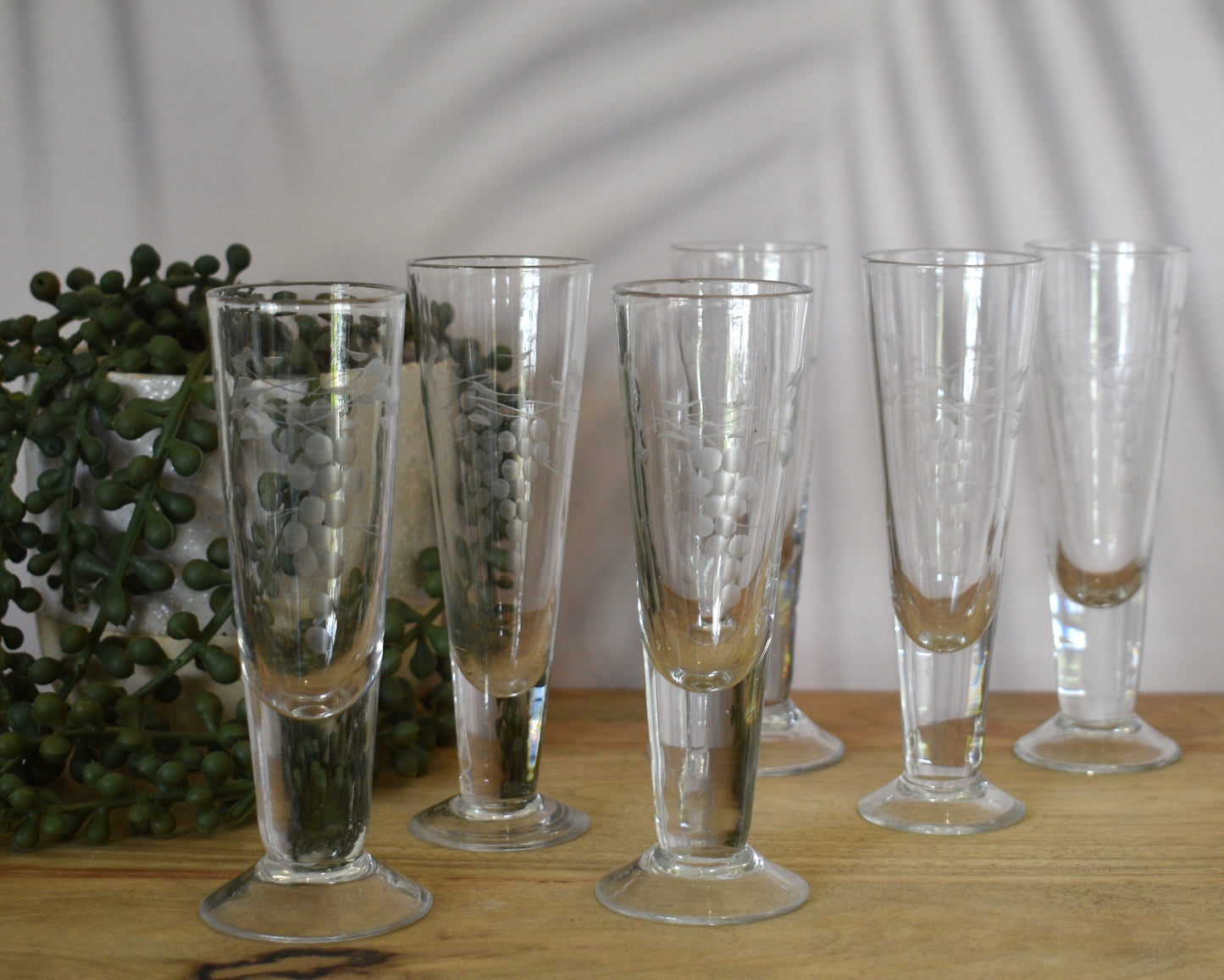 Vintage etched Grape mofit Blown Glass Decanter w/stopper and 6 footed shot glasses.
