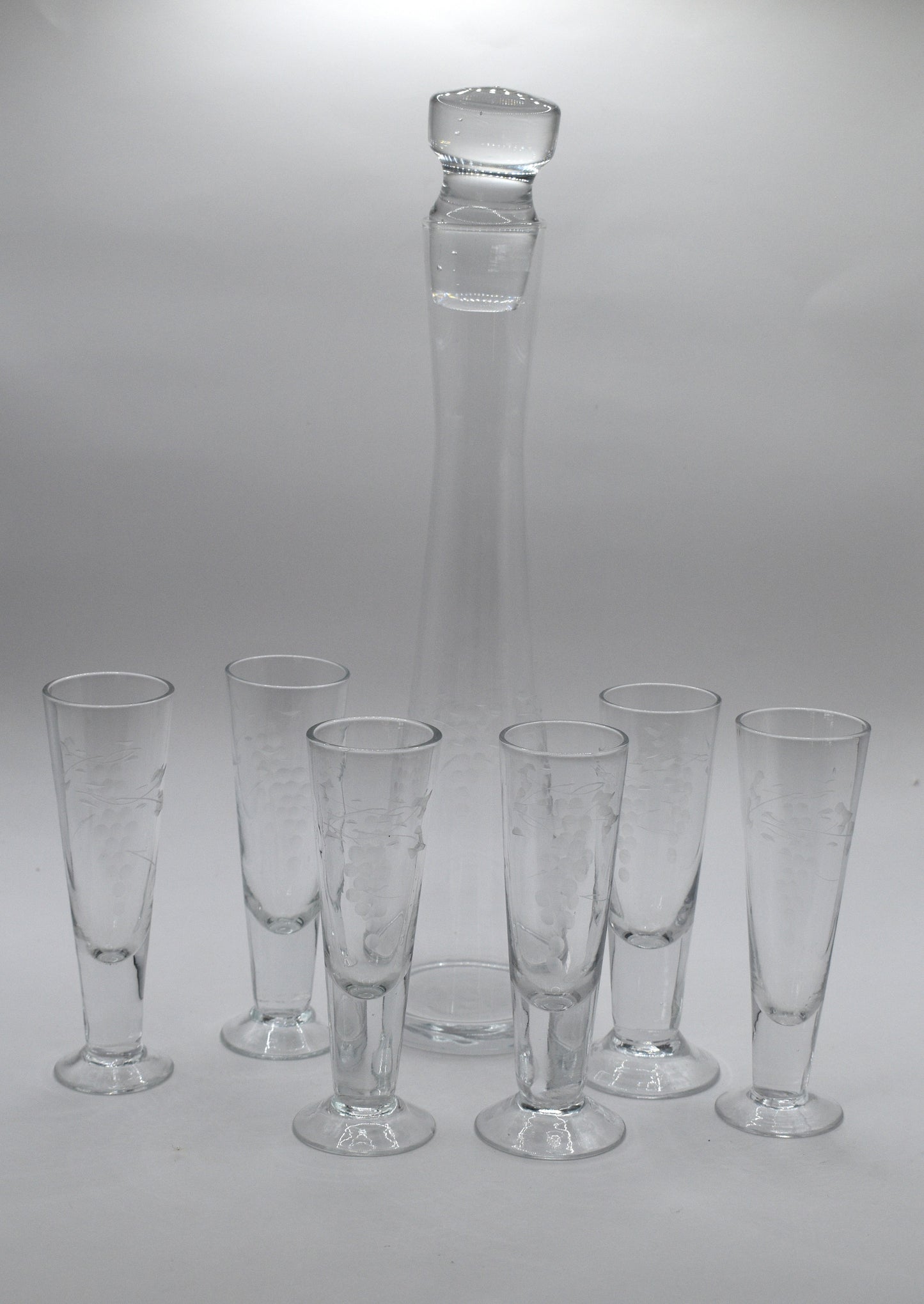 Vintage etched Grape mofit Blown Glass Decanter w/stopper and 6 footed shot glasses.