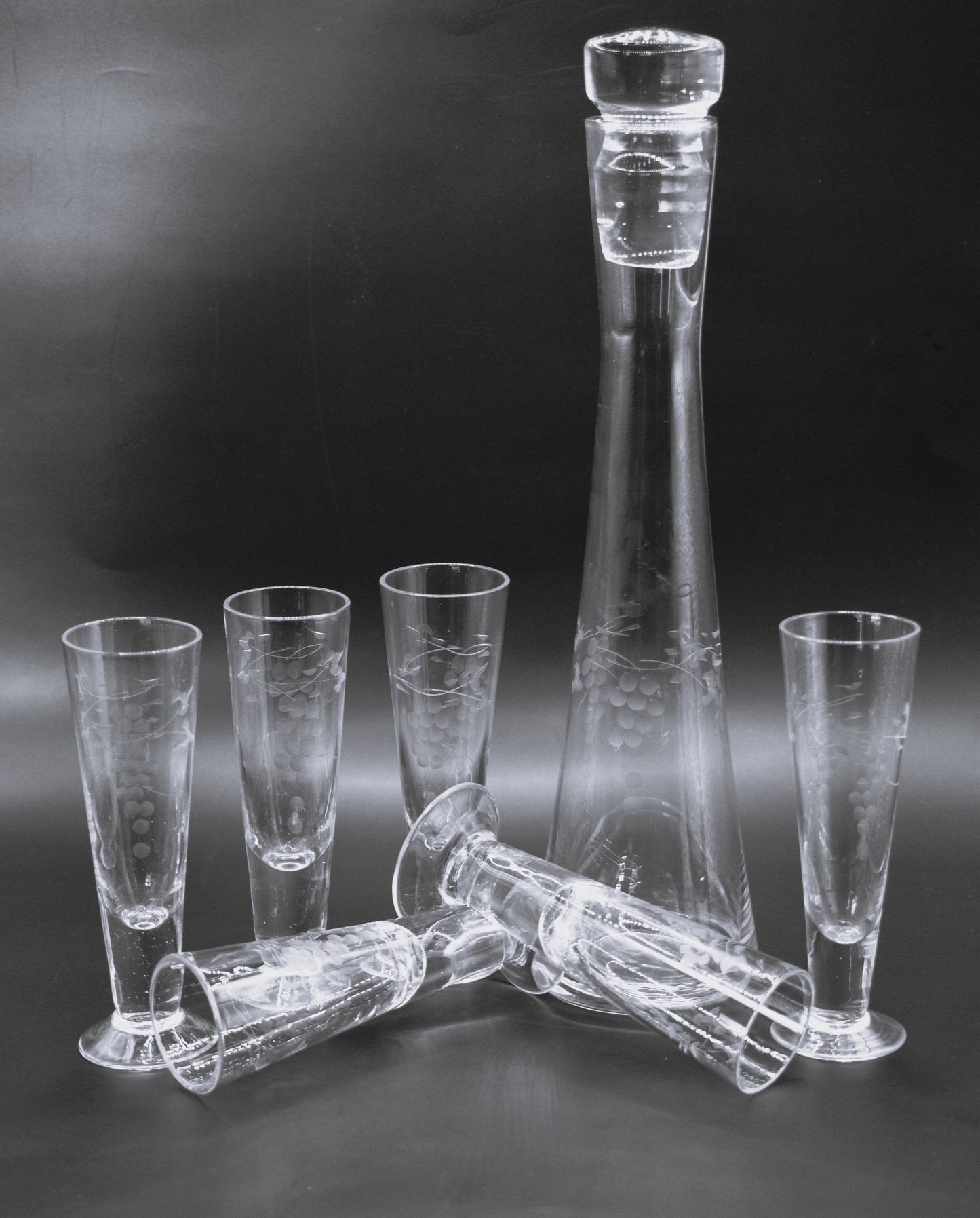 Vintage etched Grape mofit Blown Glass Decanter w/stopper and 6 footed shot glasses.