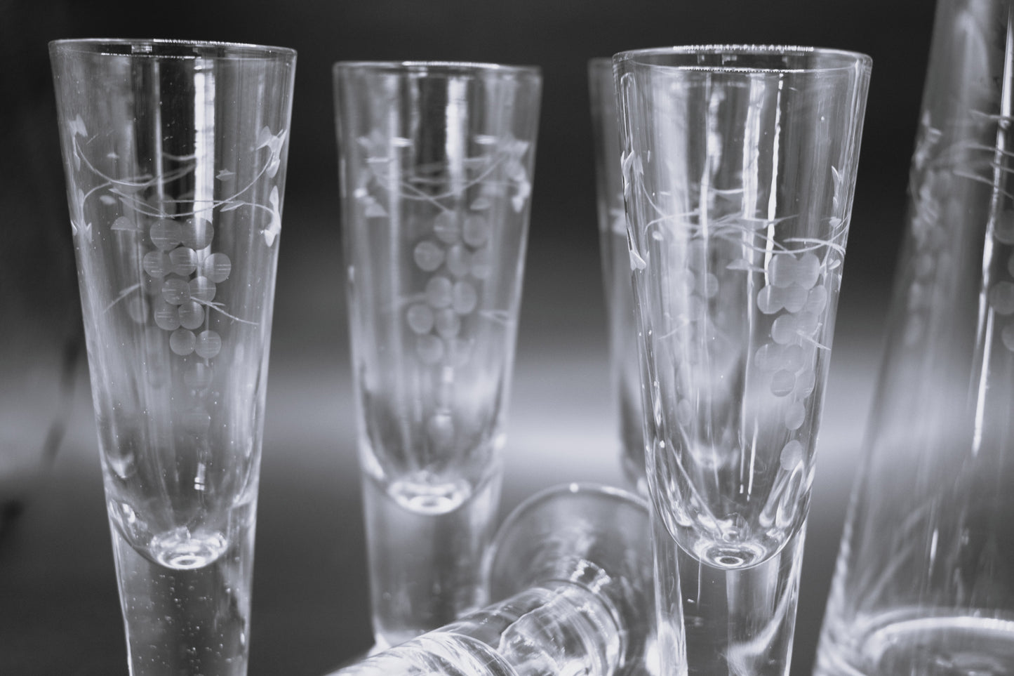 Vintage etched Grape mofit Blown Glass Decanter w/stopper and 6 footed shot glasses.