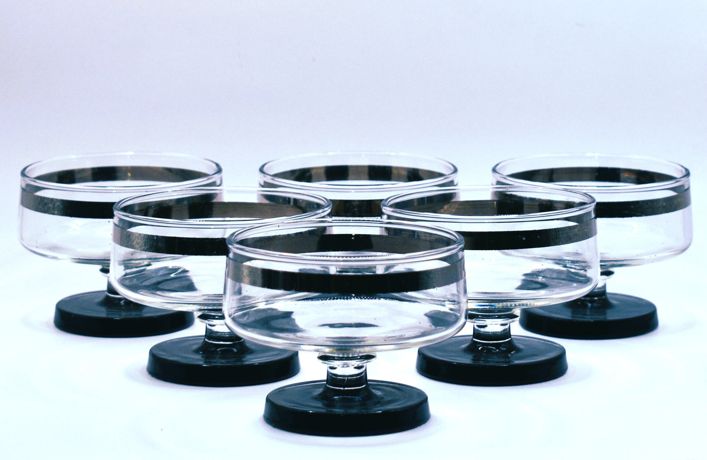 Mid Century Platinum Banded Clear Glass Champagne Coupe with short stem & Black foot. Set of 6