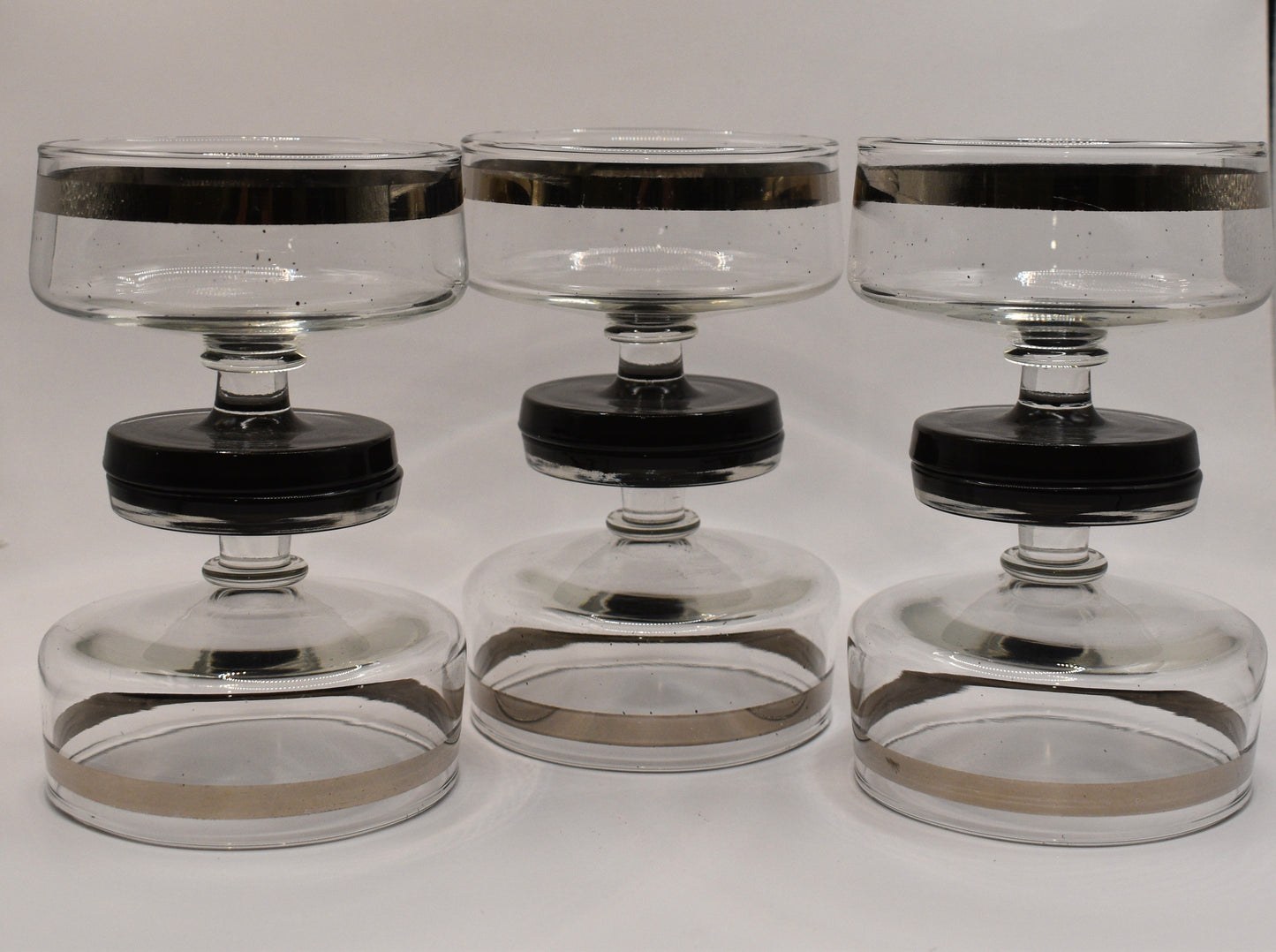 Mid Century Platinum Banded Clear Glass Champagne Coupe with short stem & Black foot. Set of 6