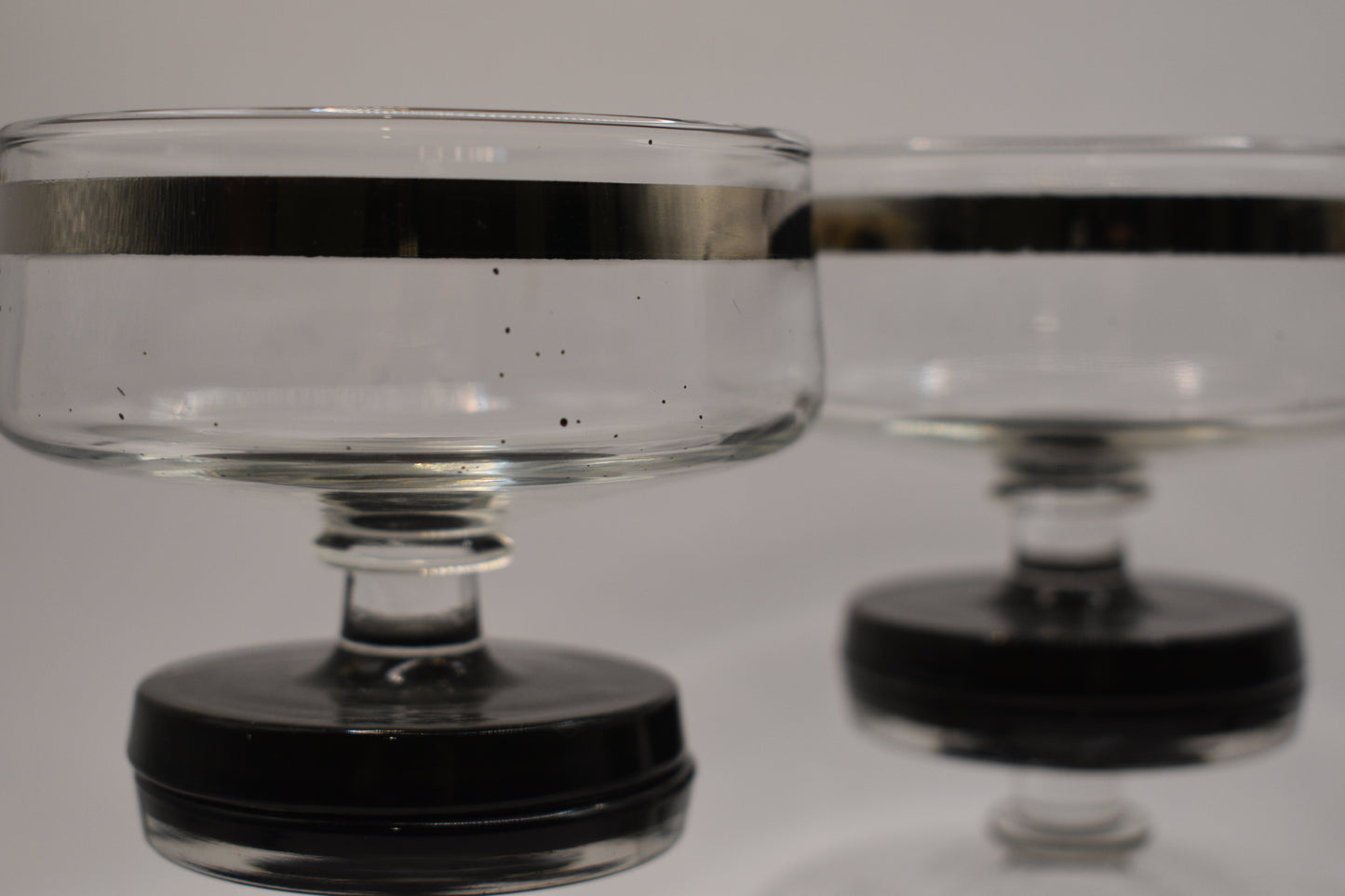 Mid Century Platinum Banded Clear Glass Champagne Coupe with short stem & Black foot. Set of 6