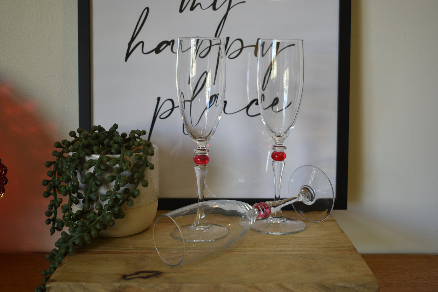 Cortina Red by Cristal D'Arques-Duraid. Champagne Flute with red wafer stem. Set of 3