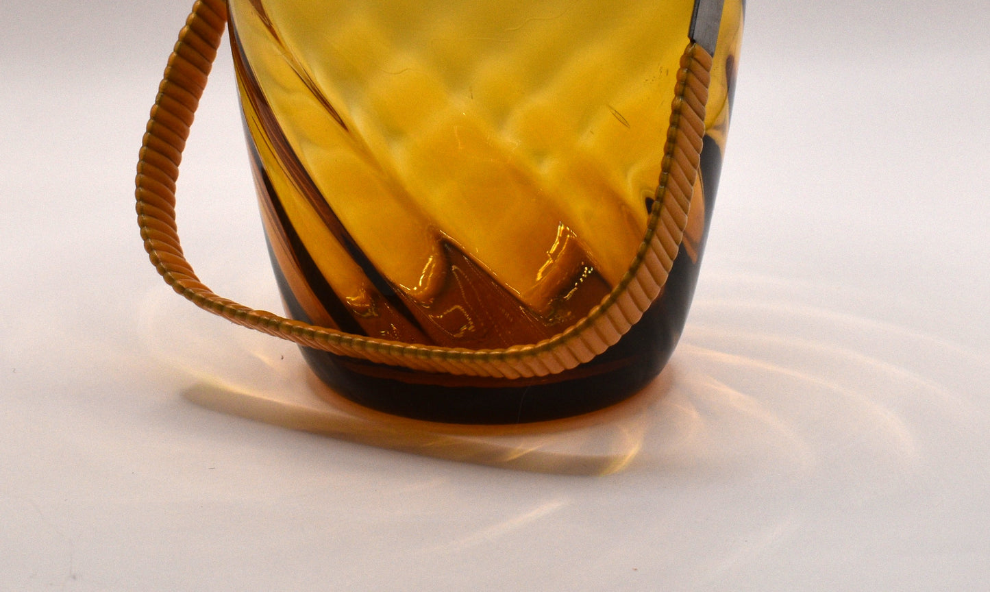 Vintage Amber Glass Ice Bucket with swing handle.