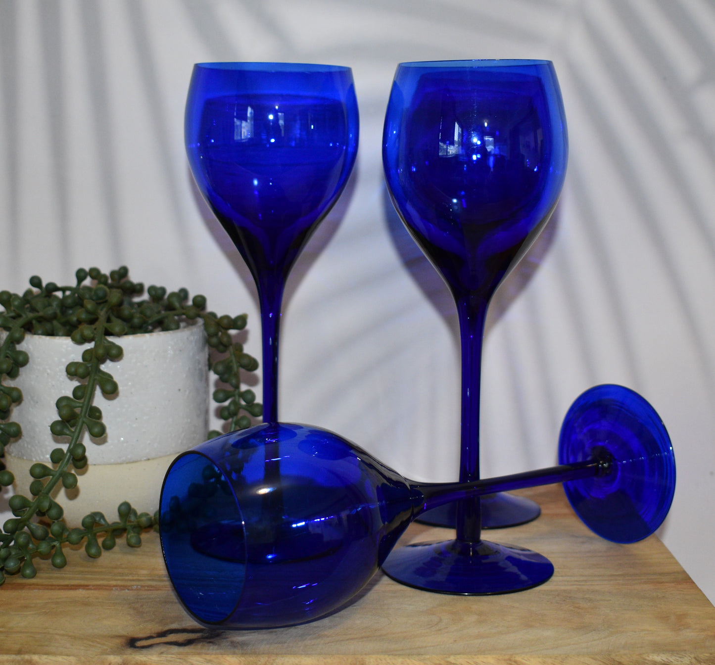 Long stemmed Cobalt Blue wine glasses. Set of 4