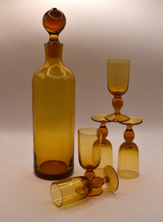 MCM Amber Decanter with 5 stemed liqueur glasses.
