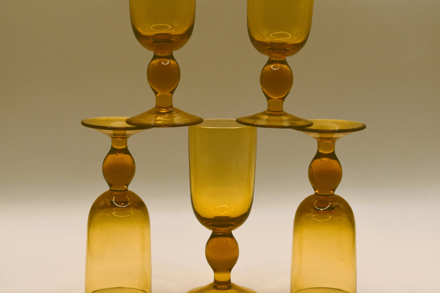 MCM Amber Decanter with 5 stemed liqueur glasses.