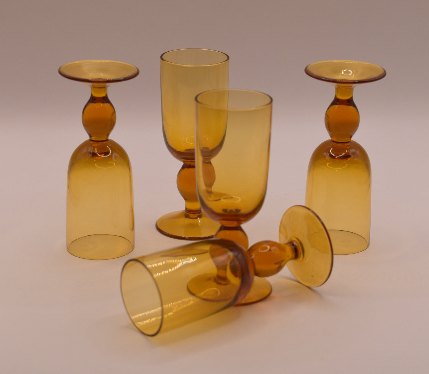 MCM Amber Decanter with 5 stemed liqueur glasses.