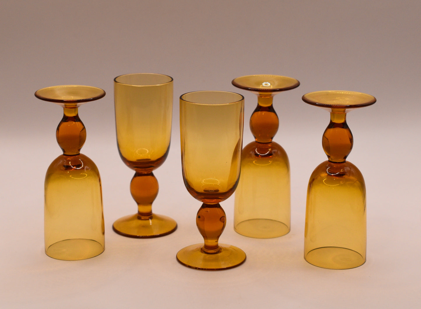 MCM Amber Decanter with 5 stemed liqueur glasses.