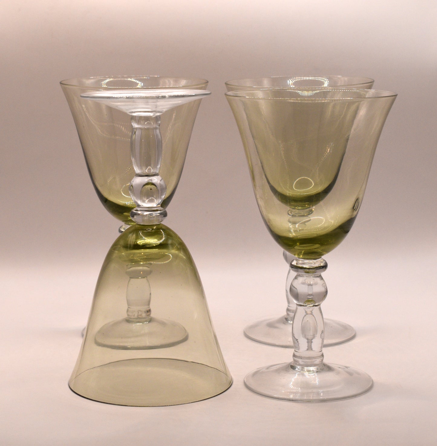 Green Glass Goblets with clear ball stems. Set of 4