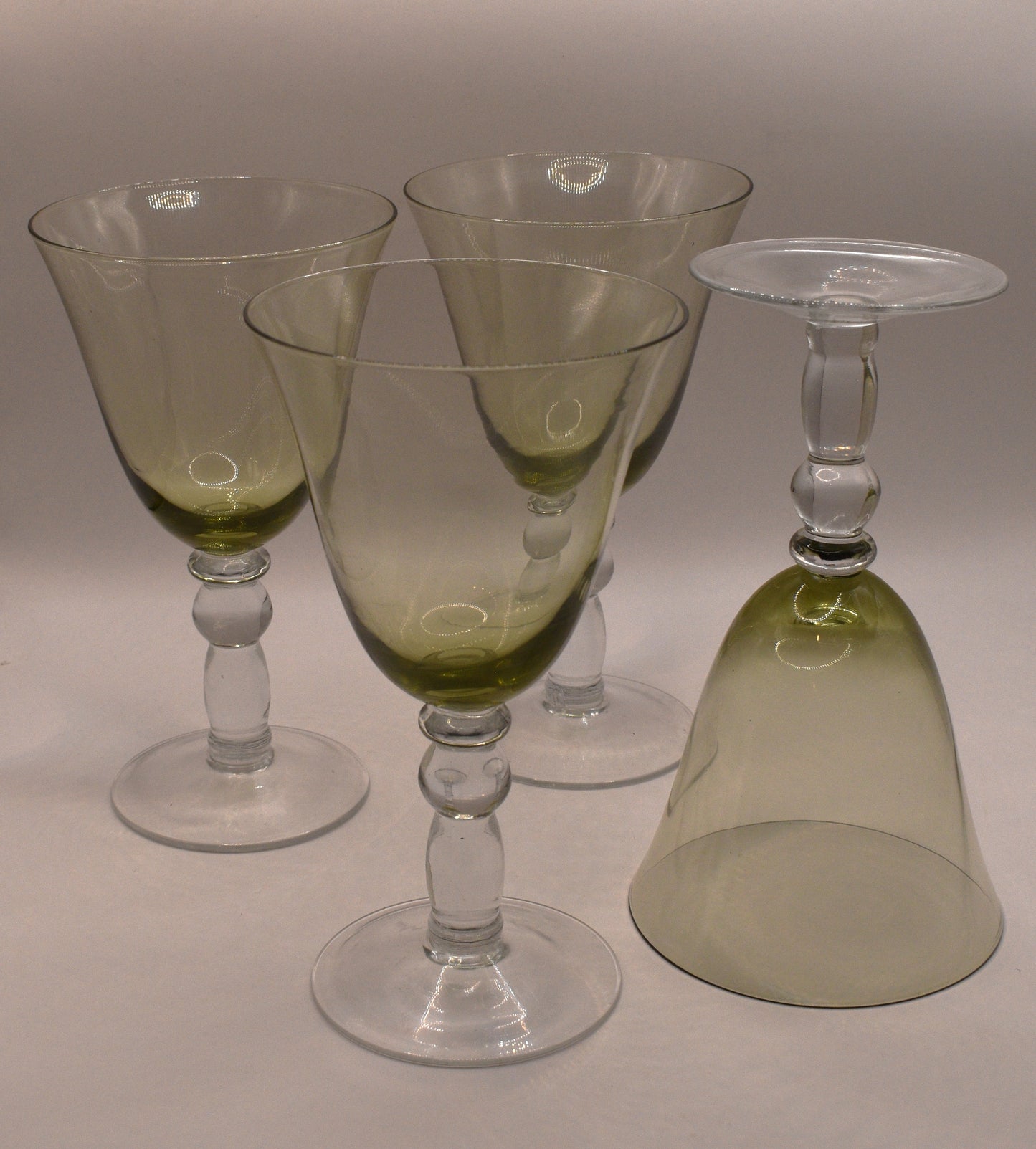 Green Glass Goblets with clear ball stems. Set of 4