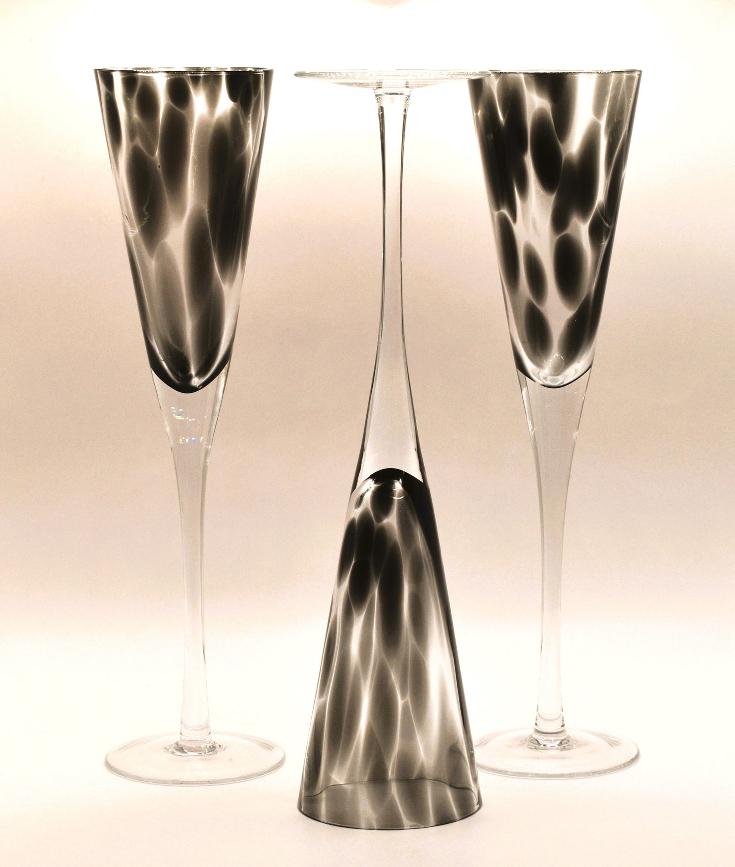 Tall stemmed trumpet styled Champagne Flutes with Black mottled glass. Set of 3