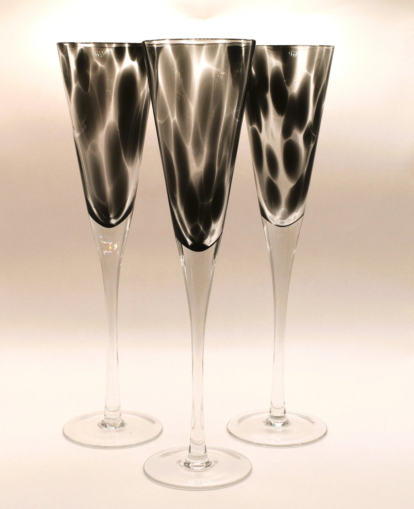 Tall stemmed trumpet styled Champagne Flutes with Black mottled glass. Set of 3