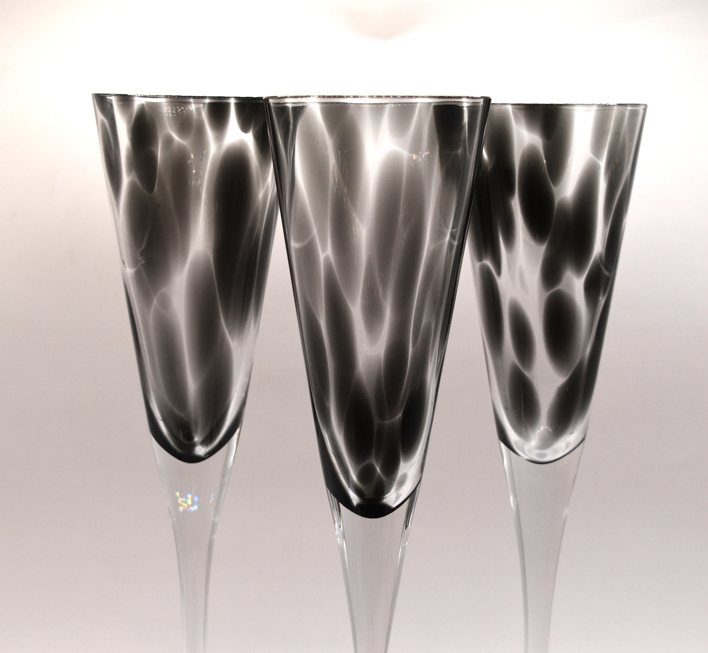 Tall stemmed trumpet styled Champagne Flutes with Black mottled glass. Set of 3