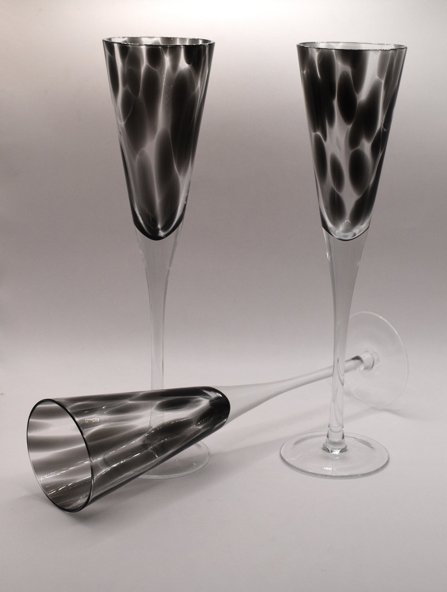 Tall stemmed trumpet styled Champagne Flutes with Black mottled glass. Set of 3