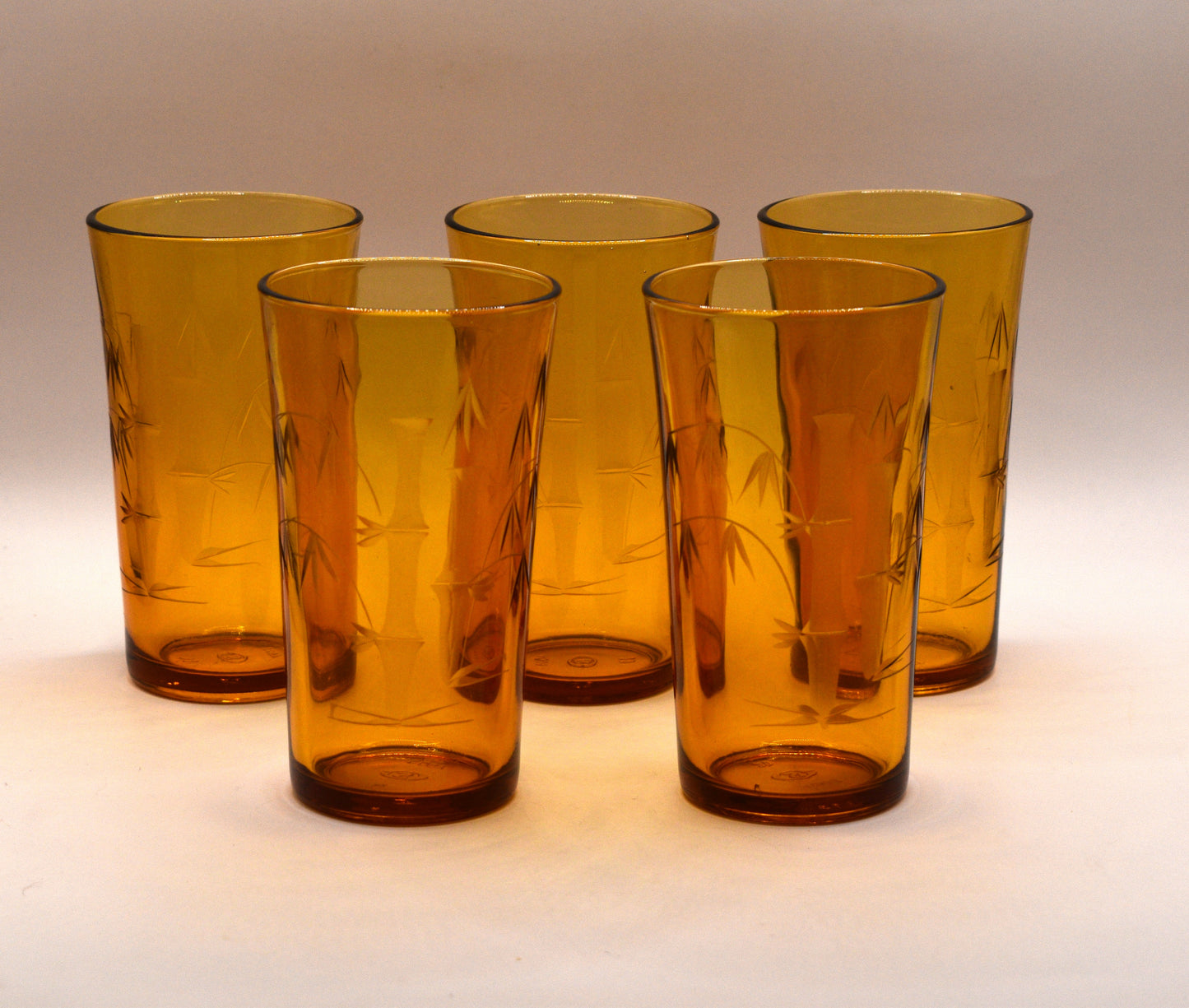 Amber tumblers with etched bamboo design. Set of 5