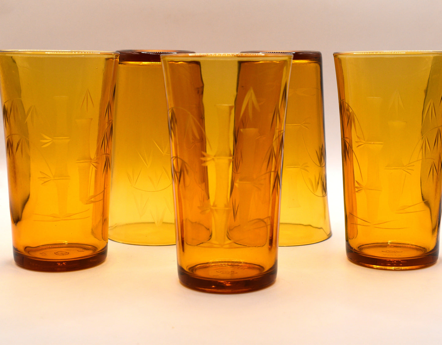Amber tumblers with etched bamboo design. Set of 5