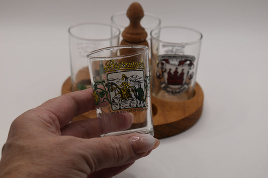 Vintage set of German Wine Tasting Glasses on wooden tray.