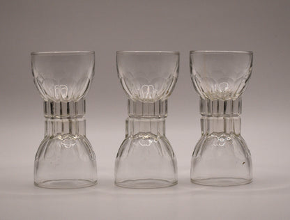 MCM clear glass shot glasses. Set of 6