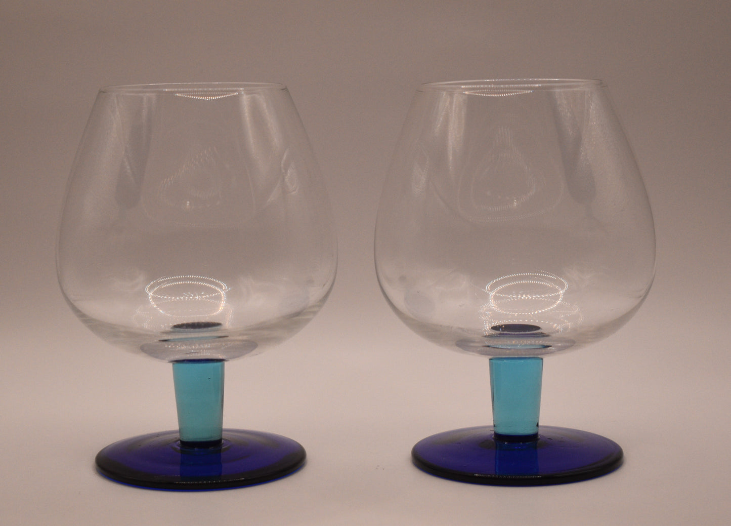 Fabulous set of 2 light blue stem with dark blue footed Brandy/Cocktail Glasses. Set of 2