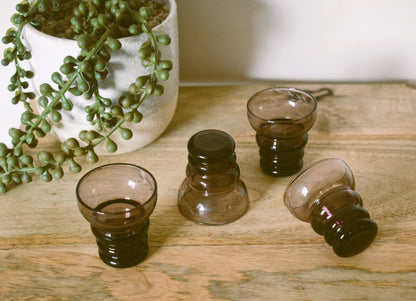 Tiny purple coloured etched shot glasses. Set of 4