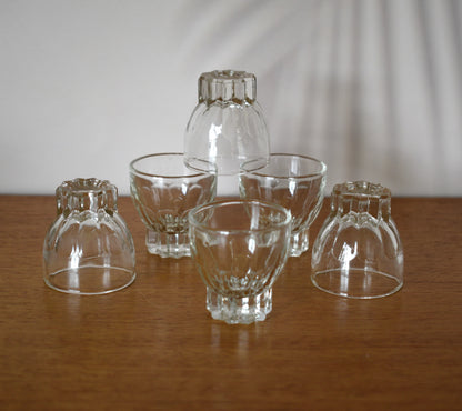 MCM clear glass shot glasses. Set of 6