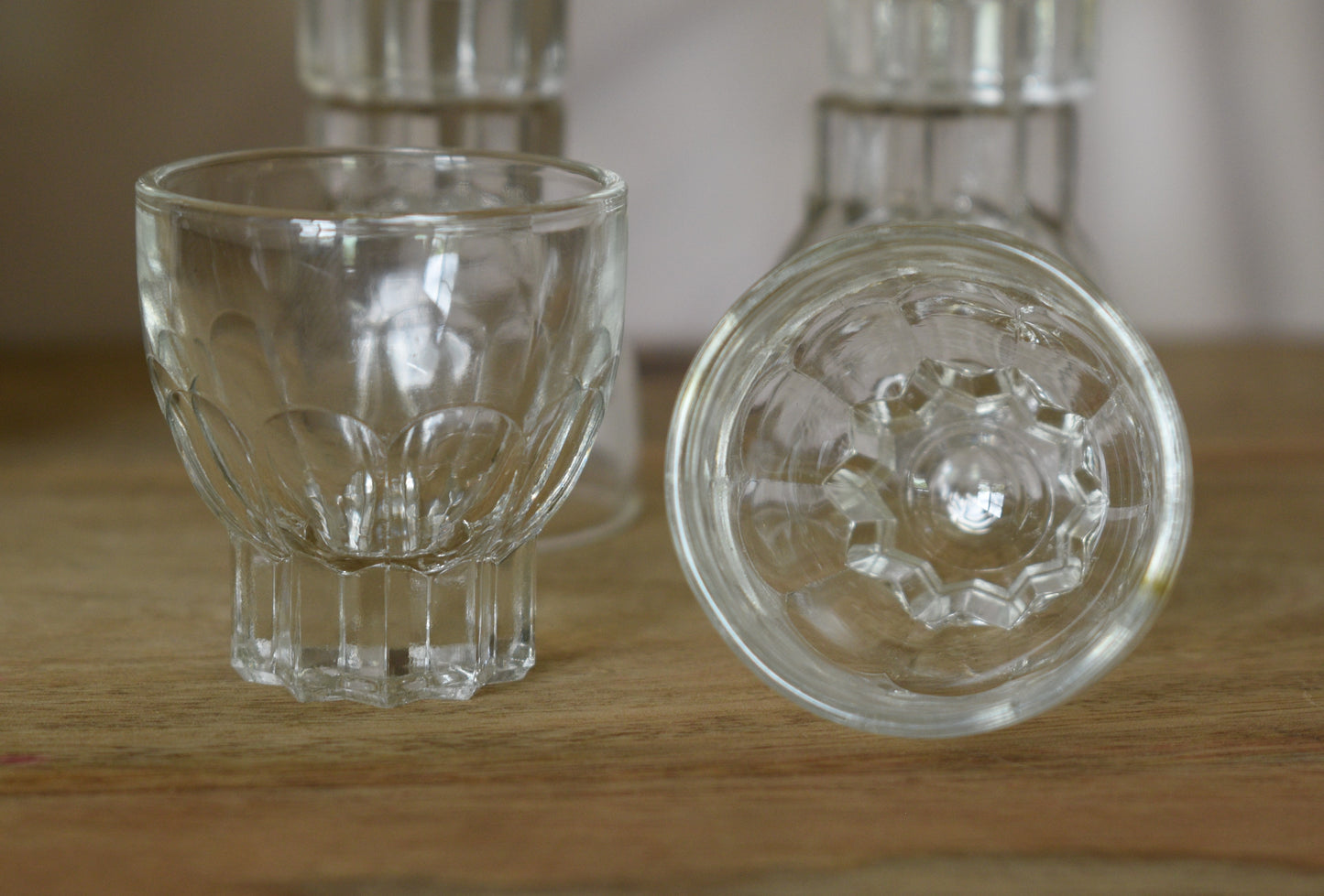 MCM clear glass shot glasses. Set of 6