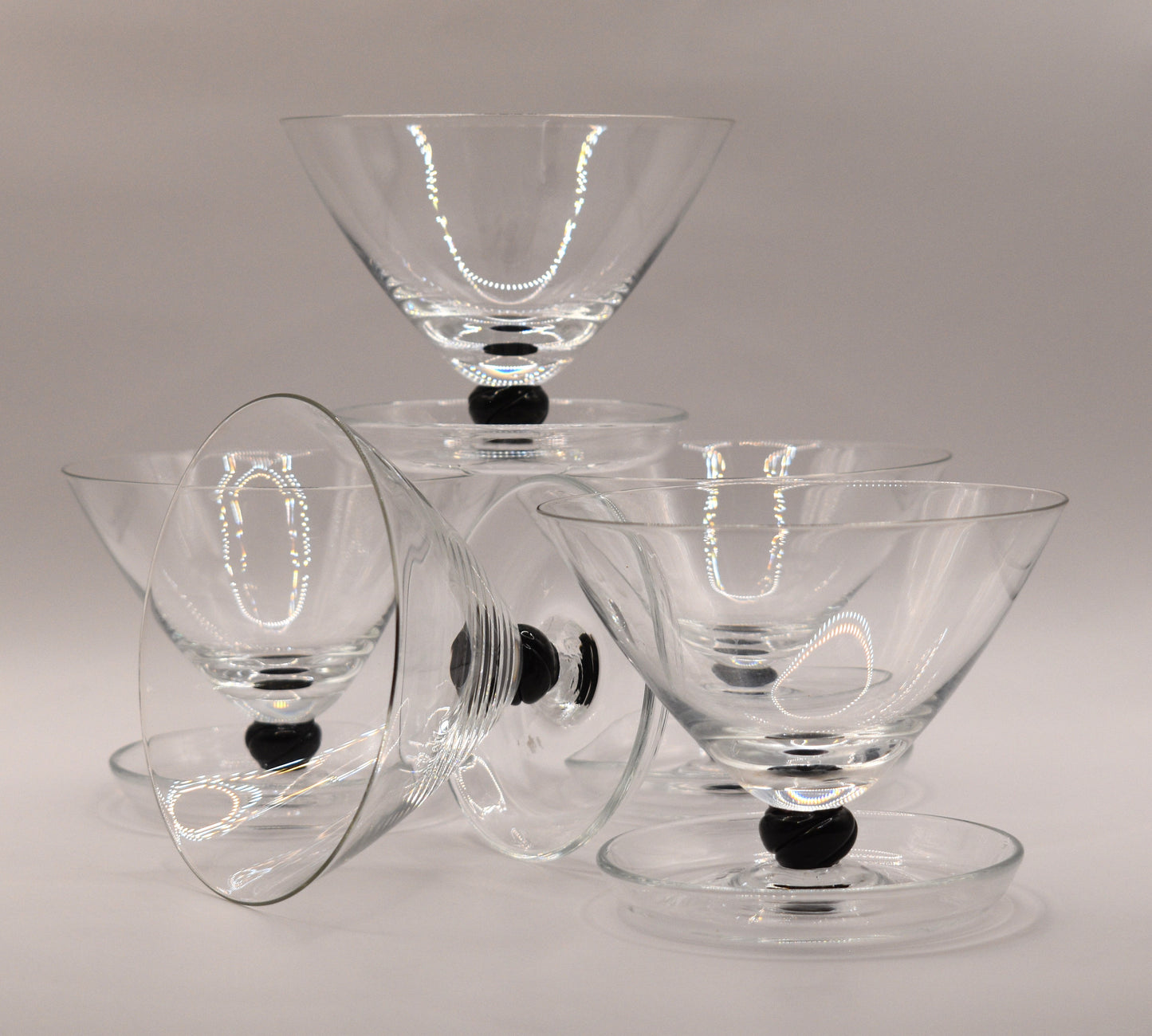 clear glass footed dessert bowl with balck ball stem. Champagne Coupe. Set of 5