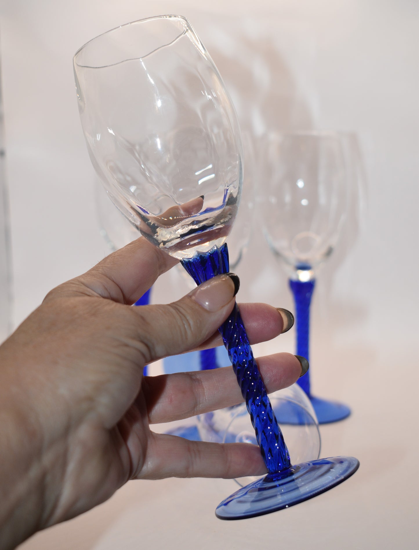 Vintage Blue Wine Glasses. Set of 5. Blue twisted stem and optical swirl bowl.