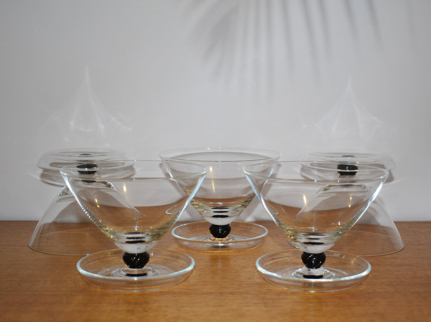 clear glass footed dessert bowl with balck ball stem. Champagne Coupe. Set of 5