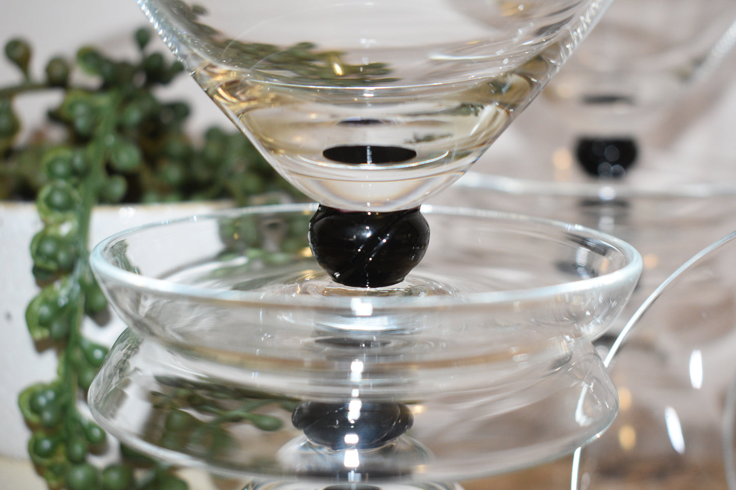 clear glass footed dessert bowl with balck ball stem. Champagne Coupe. Set of 5