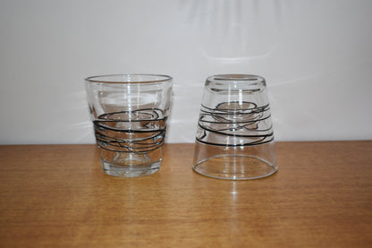 Uzu Clear and black fused handblown lowball glasses. Set of 2