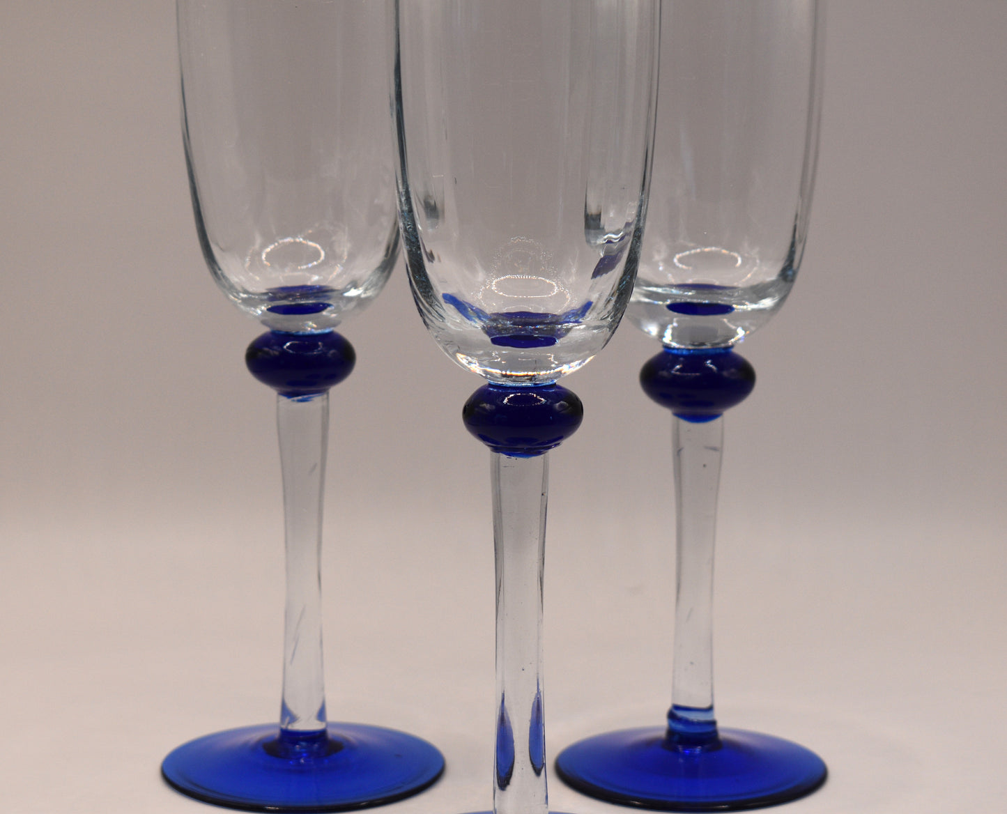 Champagne Flutes with blue foot. set of 3