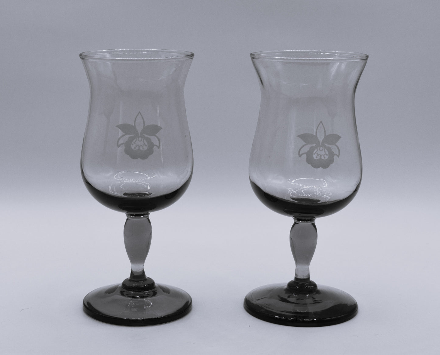 Amber wine goblets with embosed orchid design. Set of 2