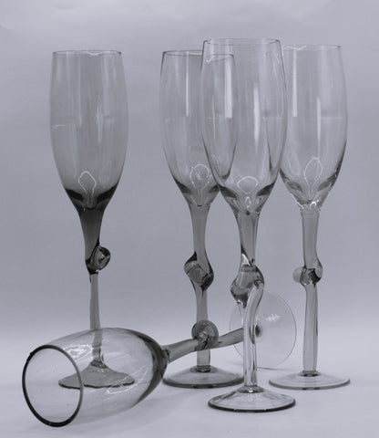 Set of 5 Harlequin coloured Champagne flutes with knotted stems