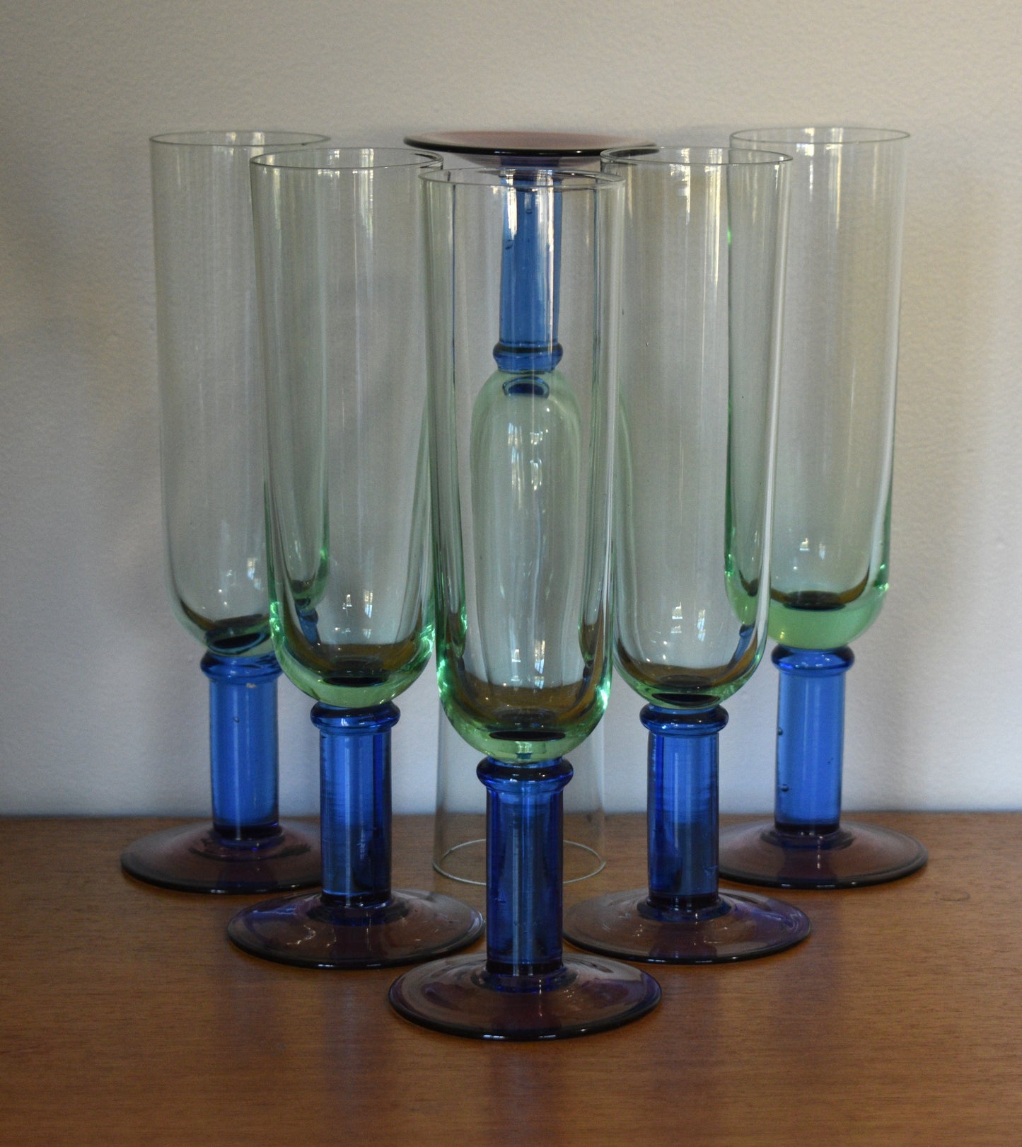 Green glass Champagne Flutes with blue stem and purple foot. Handblown. Set of 5