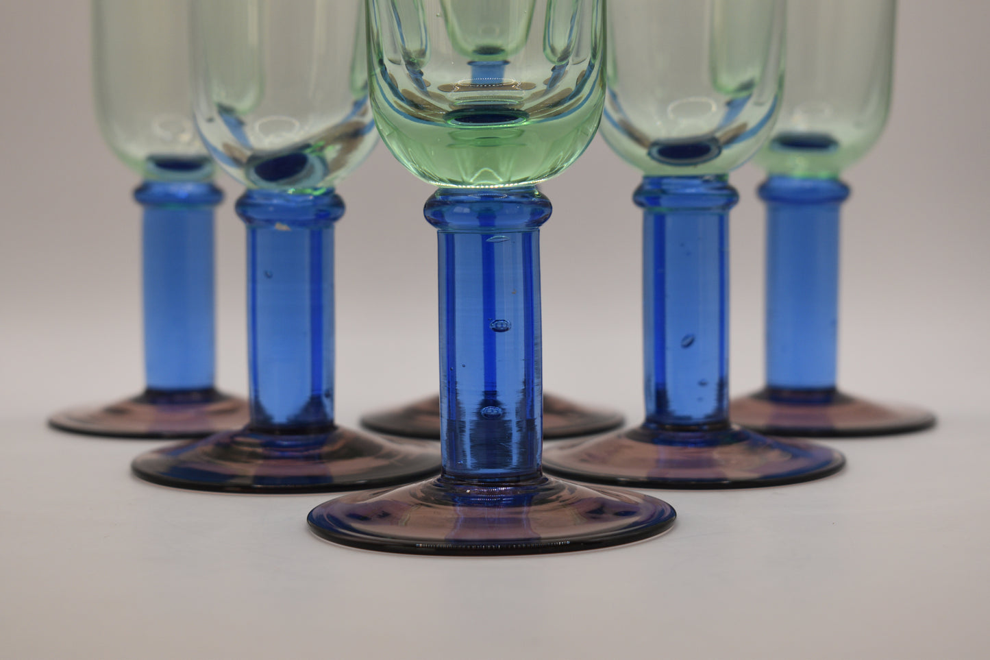 Green glass Champagne Flutes with blue stem and purple foot. Handblown. Set of 5