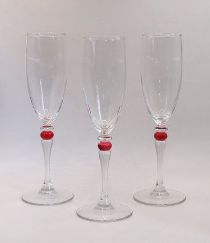 Cortina Red by Cristal D'Arques-Duraid. Champagne Flute with red wafer stem. Set of 3