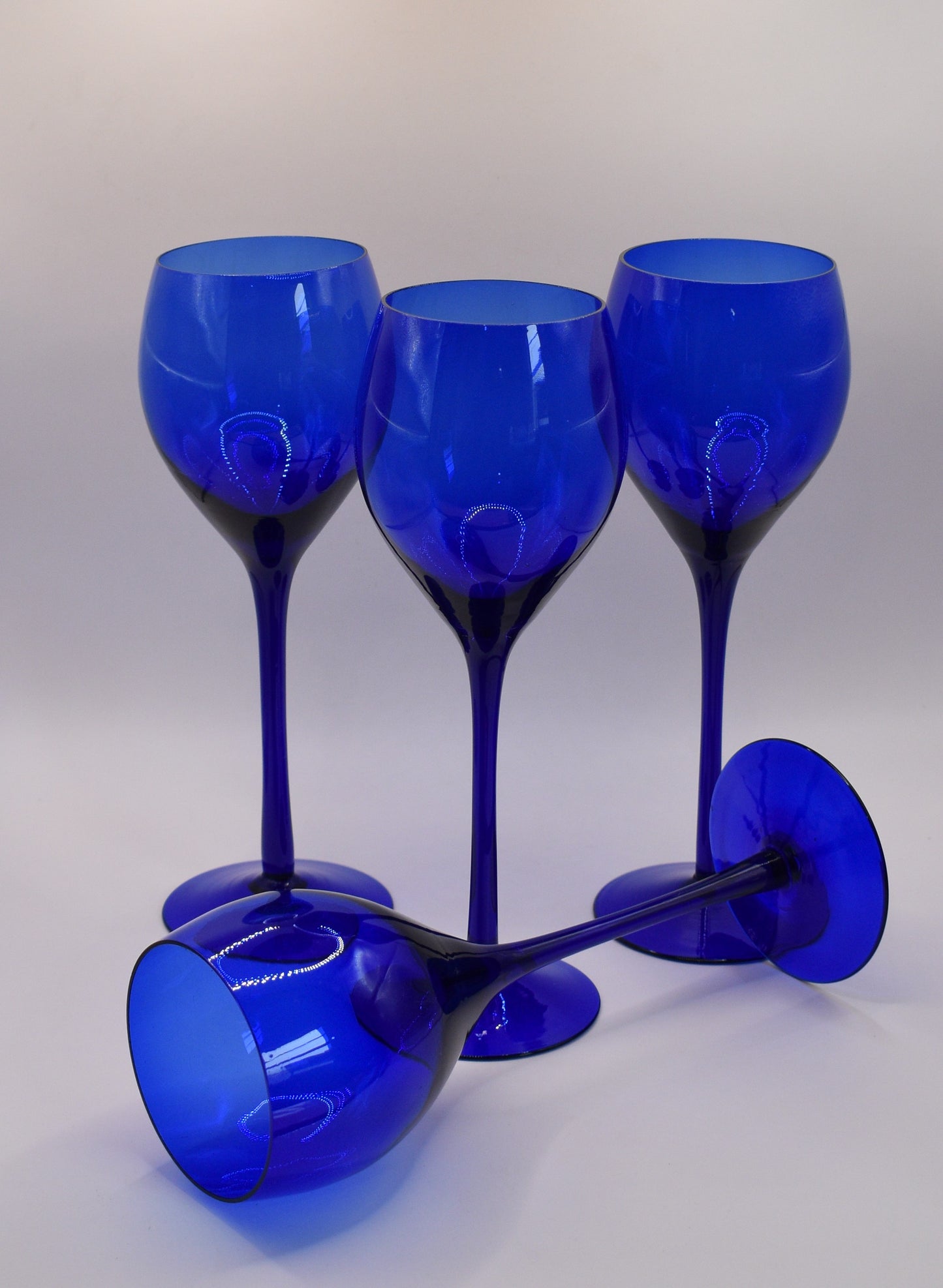 Long stemmed Cobalt Blue wine glasses. Set of 4