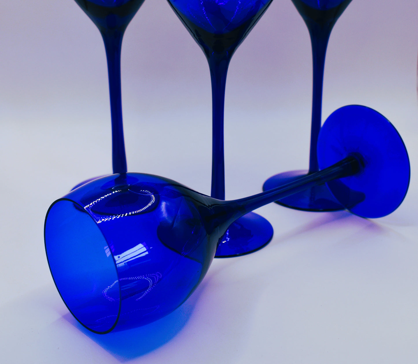 Long stemmed Cobalt Blue wine glasses. Set of 4