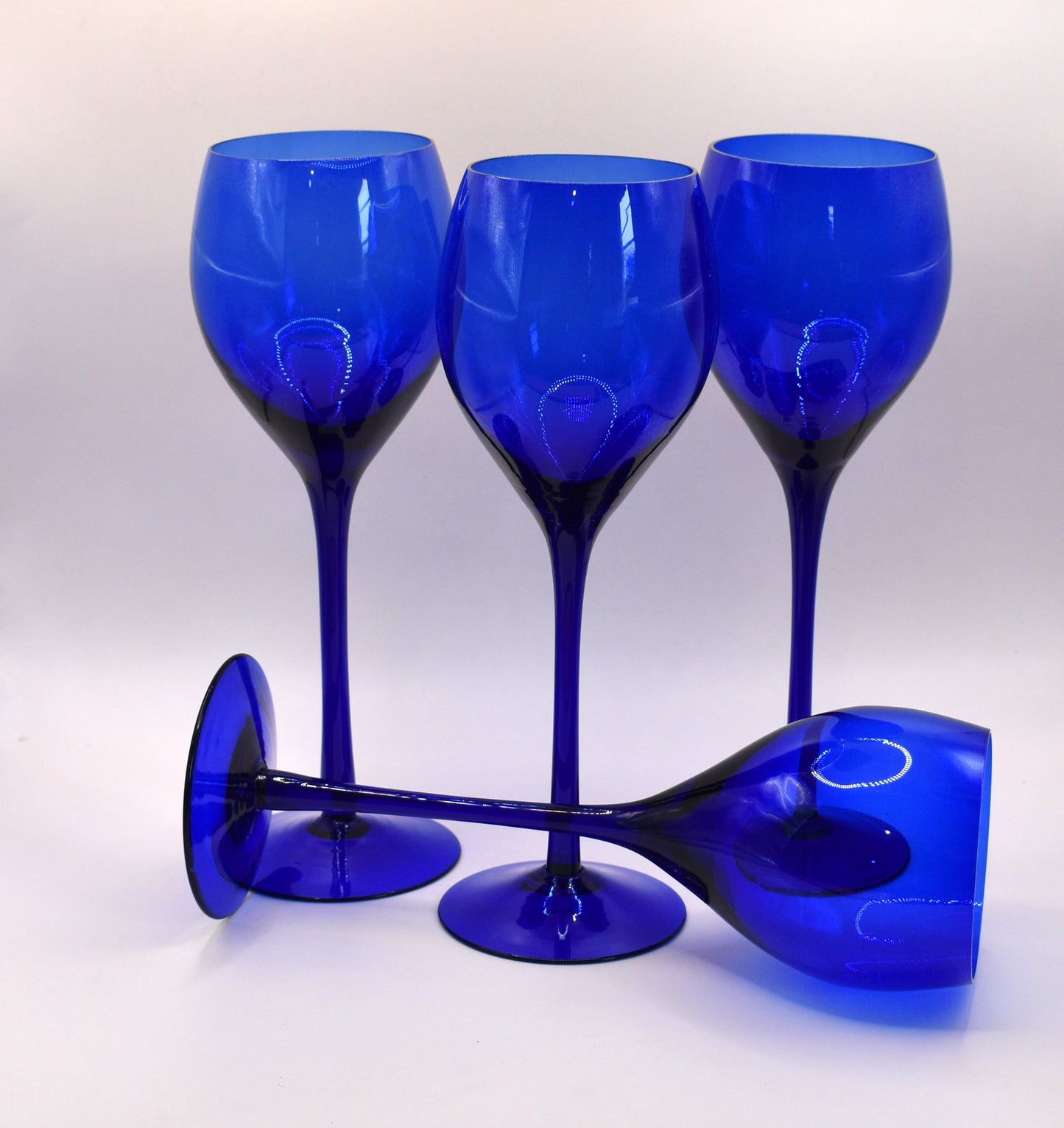 Long stemmed Cobalt Blue wine glasses. Set of 4