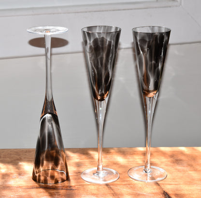 Tall stemmed trumpet styled Champagne Flutes with Black mottled glass. Set of 3