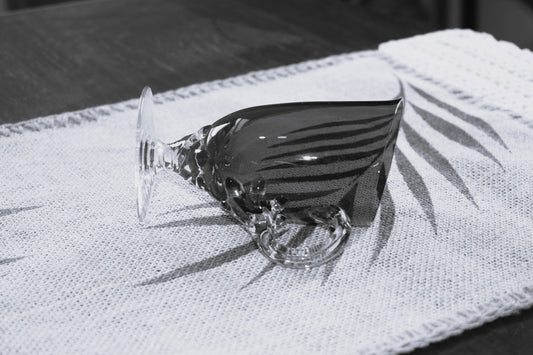 Vintage Ruby Red jug with clear claw stem and handle.