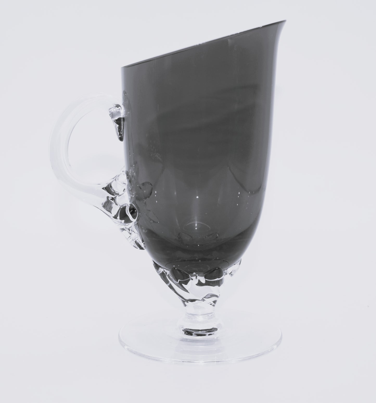 Vintage Ruby Red jug with clear claw stem and handle.