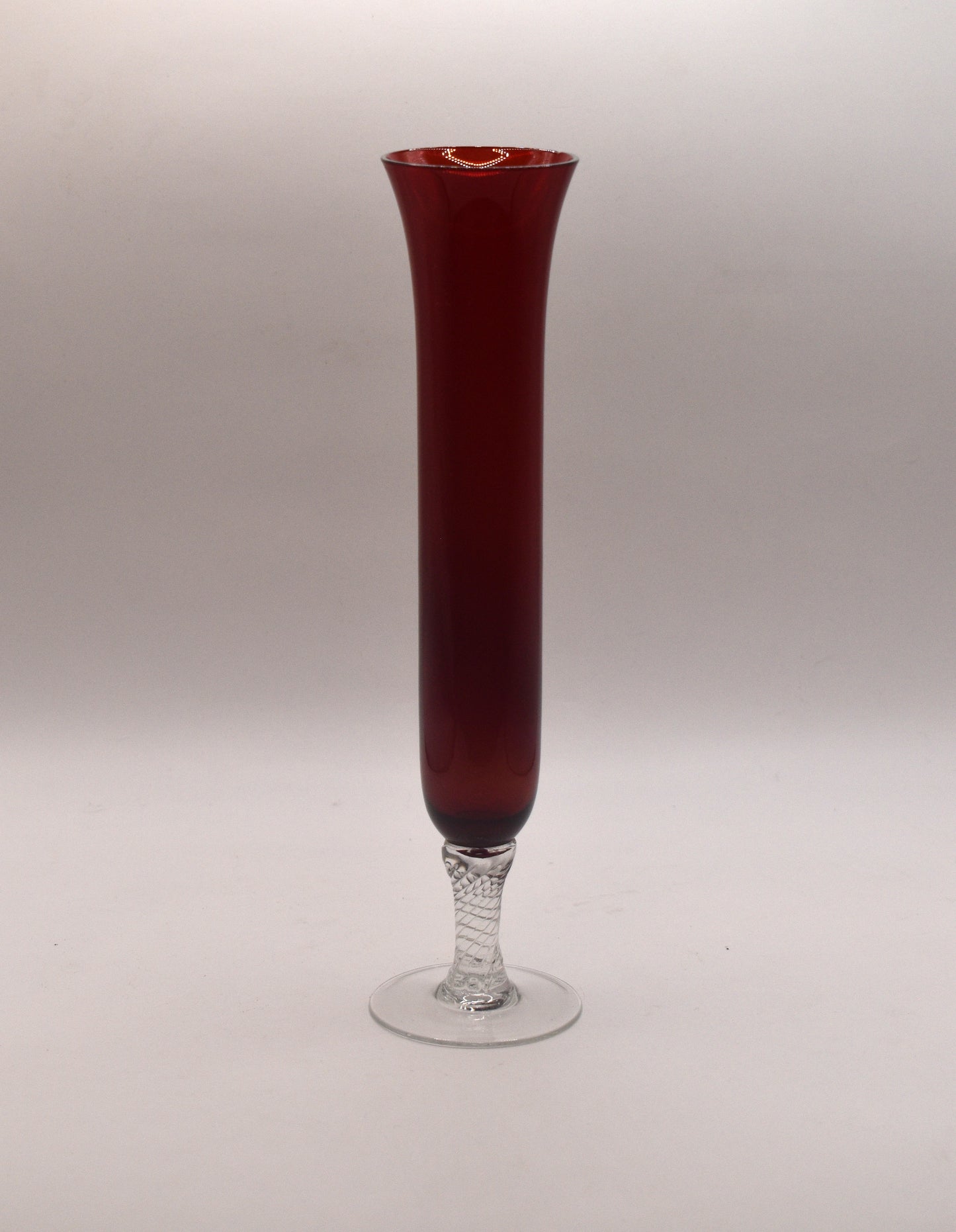 Vintage ruby red long stemmed bud vase.
