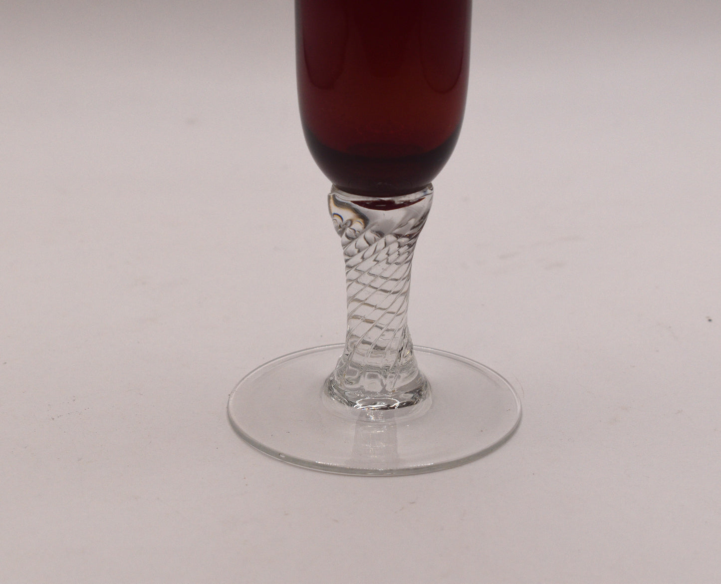 Vintage ruby red long stemmed bud vase.