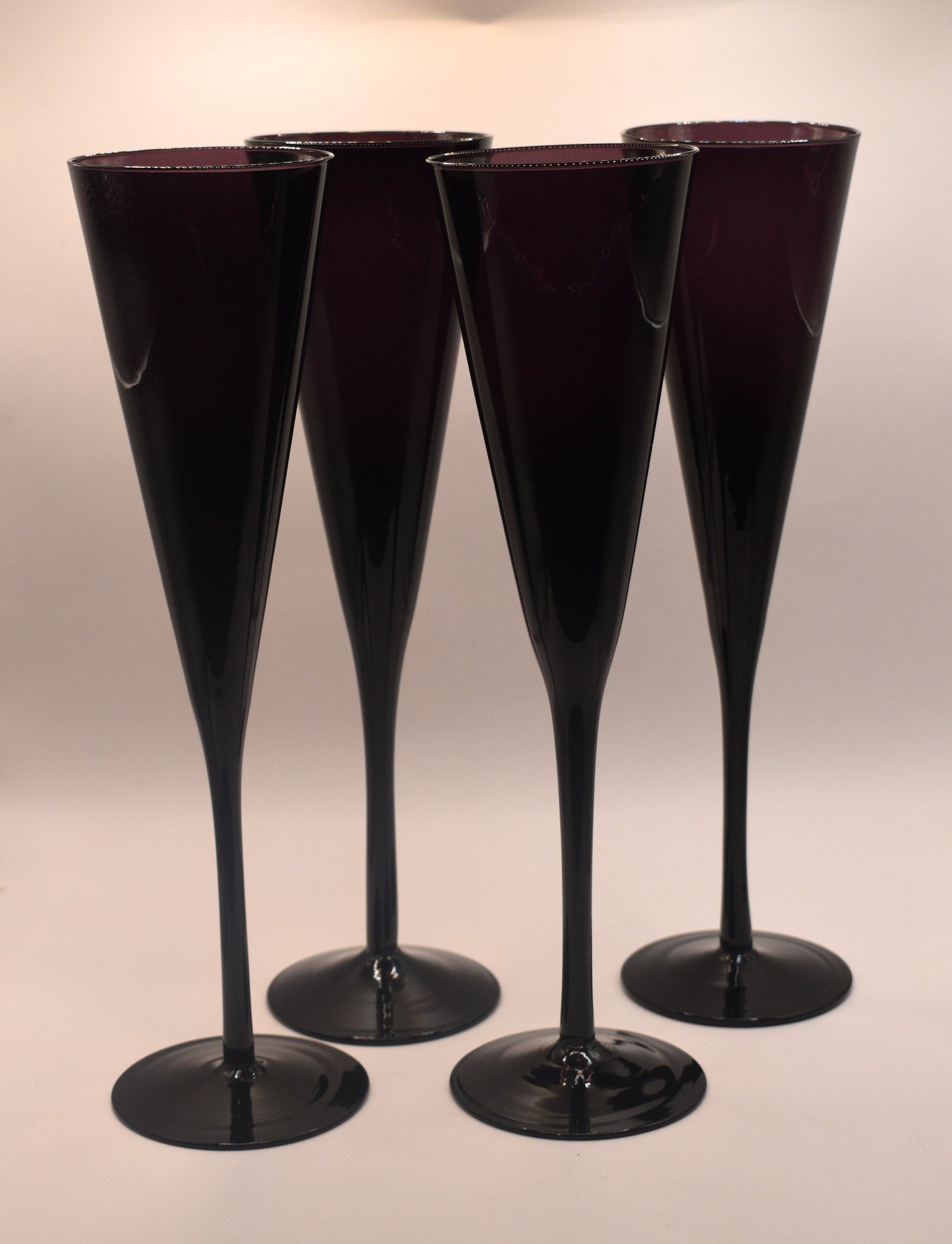 Tall stemmed trumpet styled Amethyst/Purple Champagne flutes. Set of 4