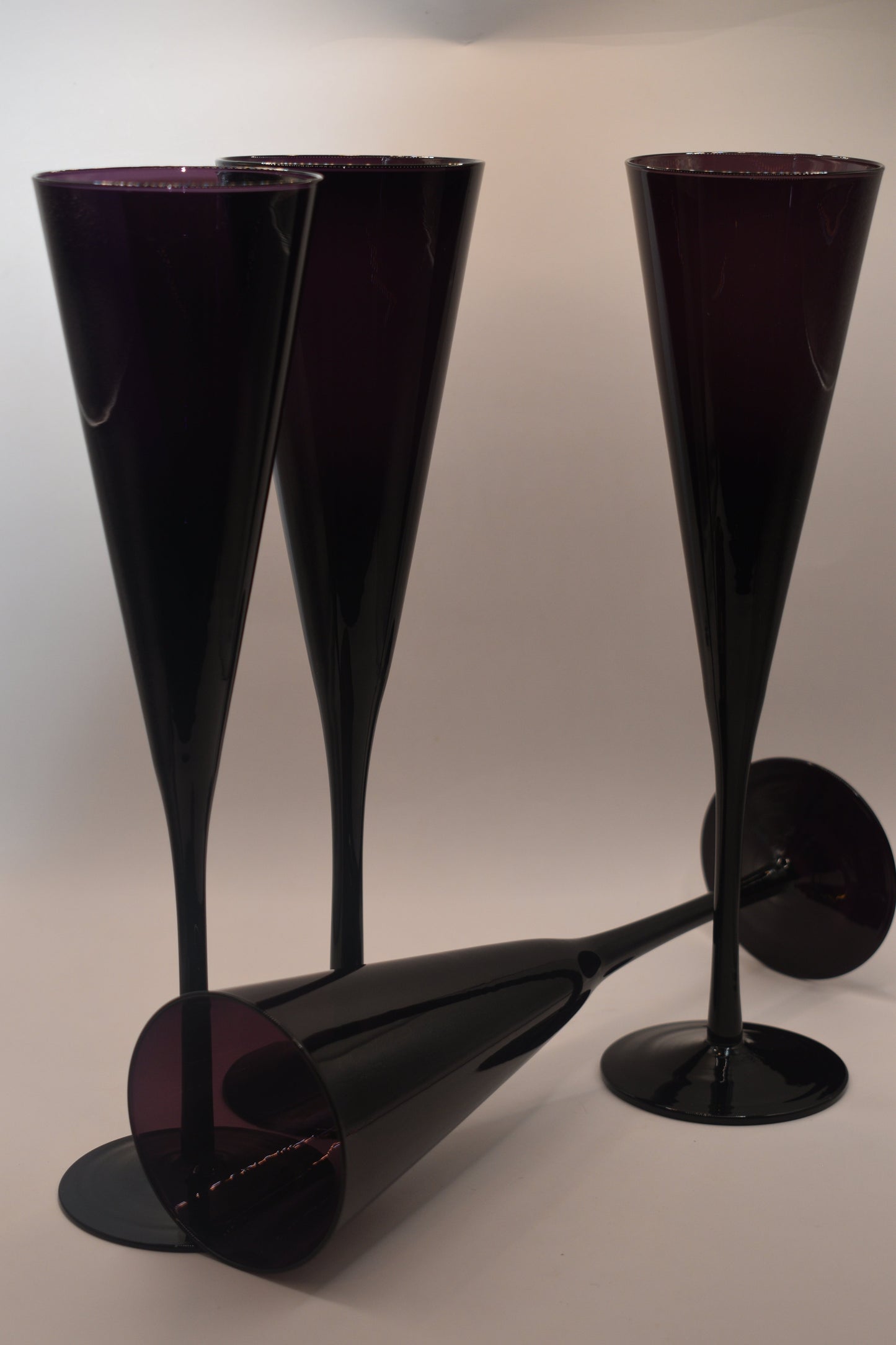 Tall stemmed trumpet styled Amethyst/Purple Champagne flutes. Set of 4